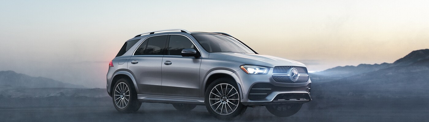 Grey Mercedes-Benz GLE 350 parked on a misty desert plain