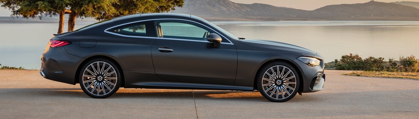 Mercedes-Benz CLE parked by a lake