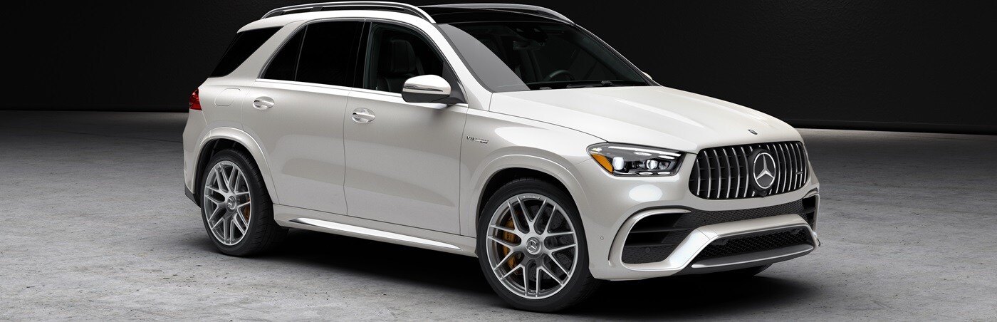 White 2024 AMG GLE SUV parked in a warehouse